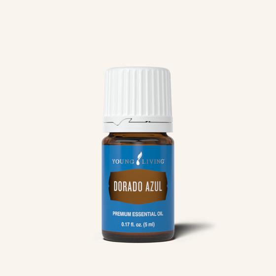 Brown bottle of Young Living's Dorado Azul essential oil with a teal blue label and white lid.