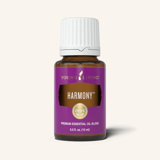 Small brown bottle of Young Living Harmony essential oil with a purple label and white lid.